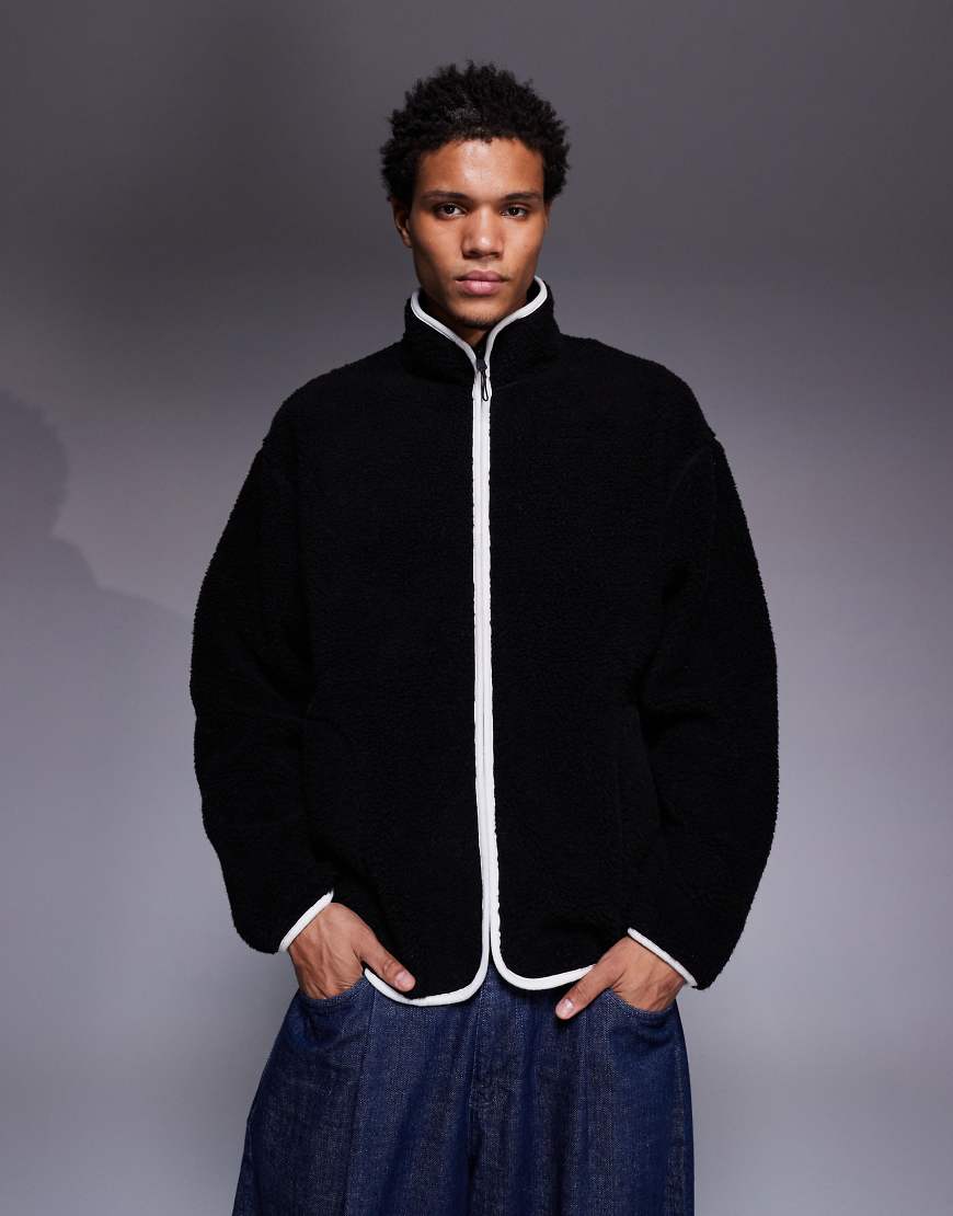 ASOS DESIGN - Locker geschnittenes Fleece-Sweatshirt in Schwarz mit Stehkragen und Reißverschluss von ASOS DESIGN