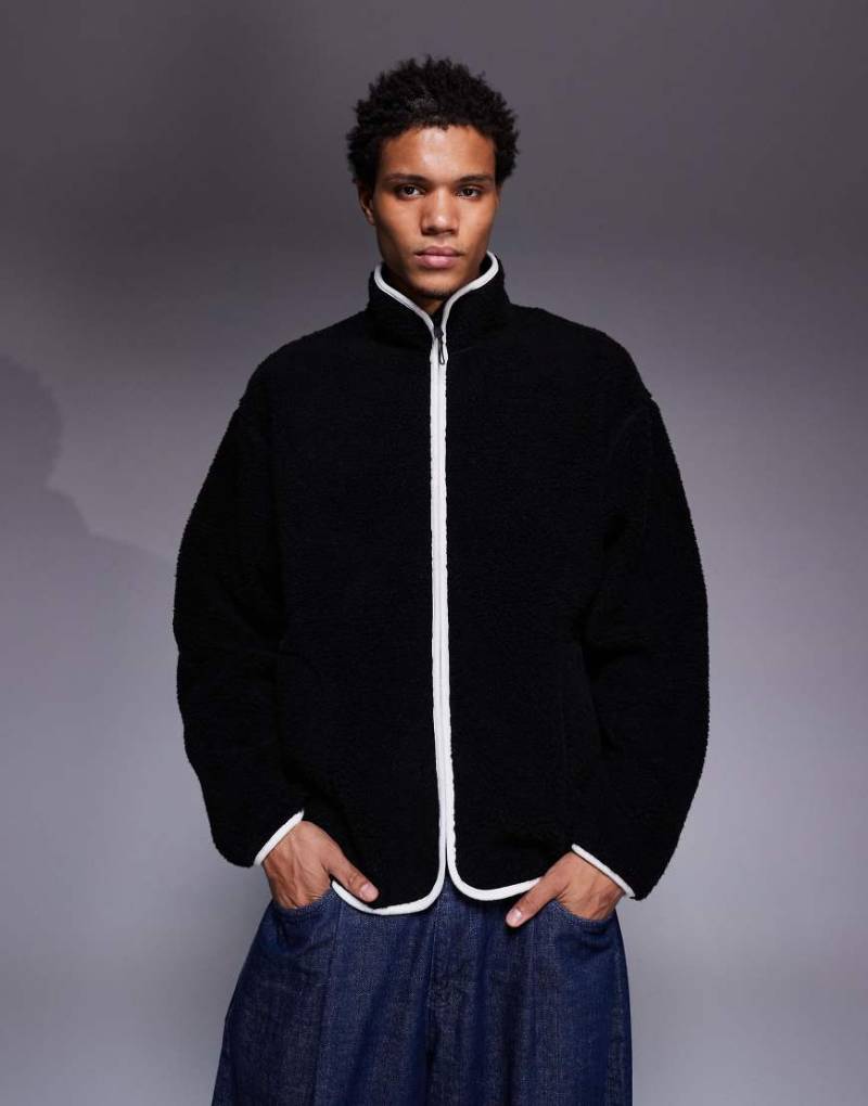 ASOS DESIGN - Locker geschnittenes Fleece-Sweatshirt in Schwarz mit Stehkragen und Reißverschluss ASOS DESIGN - Locker geschnittenes Fleece-Sweatshirt in Schwarz mit Stehkragen und Reißverschluss von ASOS DESIGN