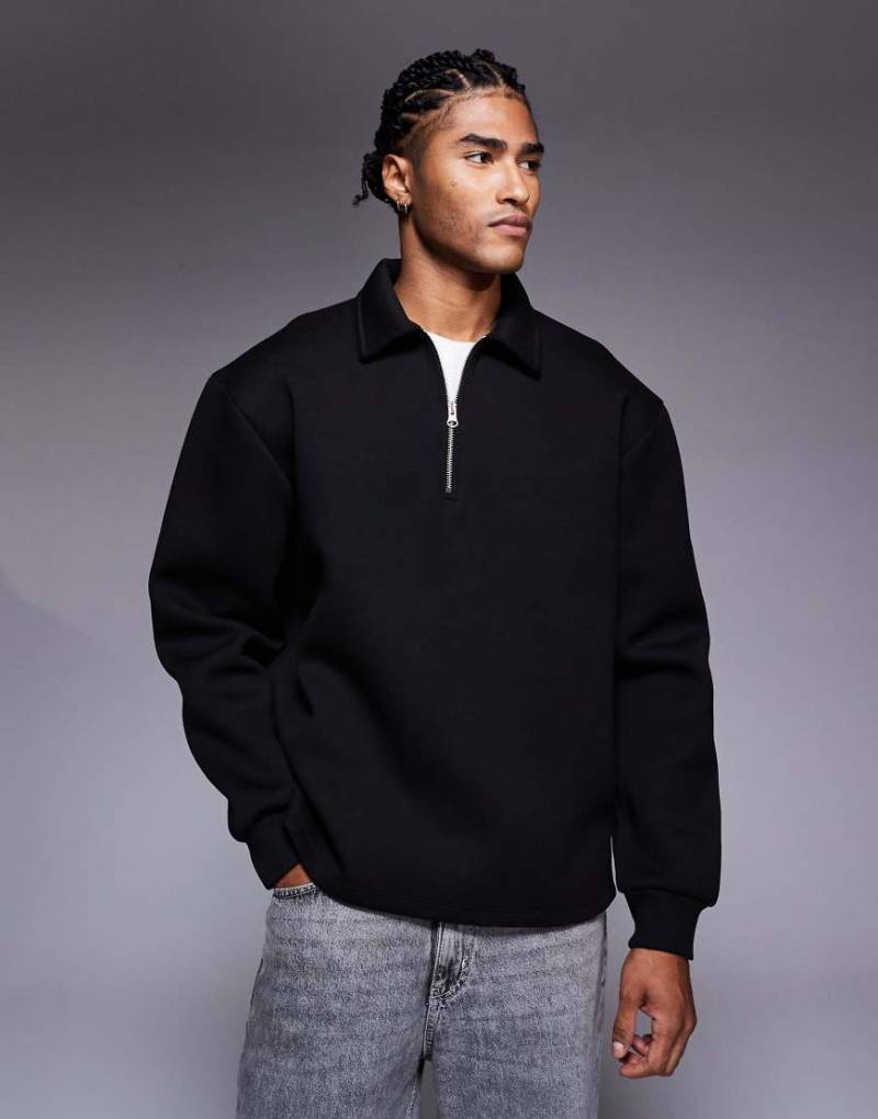 ASOS DESIGN - Oversize-Sweatshirt aus neoprenartigem Stoff in Schwarz mit kurzem Reißverschluss von ASOS DESIGN