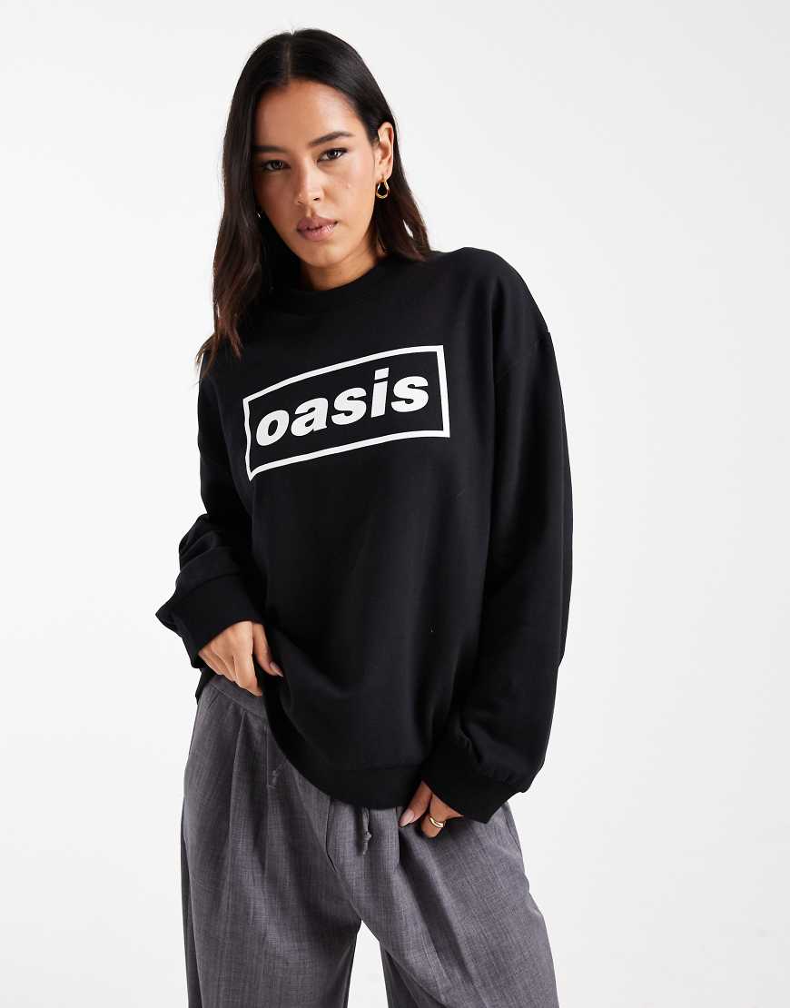 ASOS DESIGN - Oversize-Sweatshirt in Schwarz mit lizenziertem „Oasis"-Logoprint von ASOS DESIGN