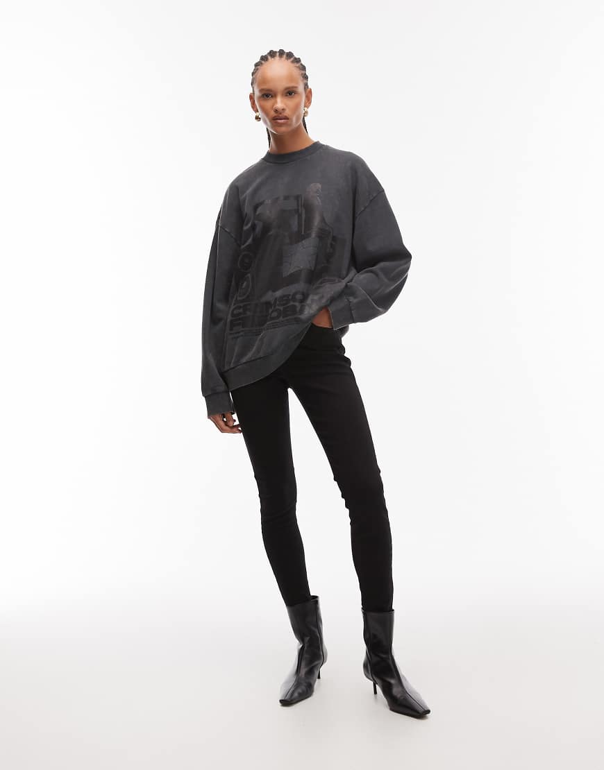 ASOS DESIGN - Oversize-Sweatshirt in verwaschenem Grau mit Vintage-Band-Grafikprint von ASOS DESIGN