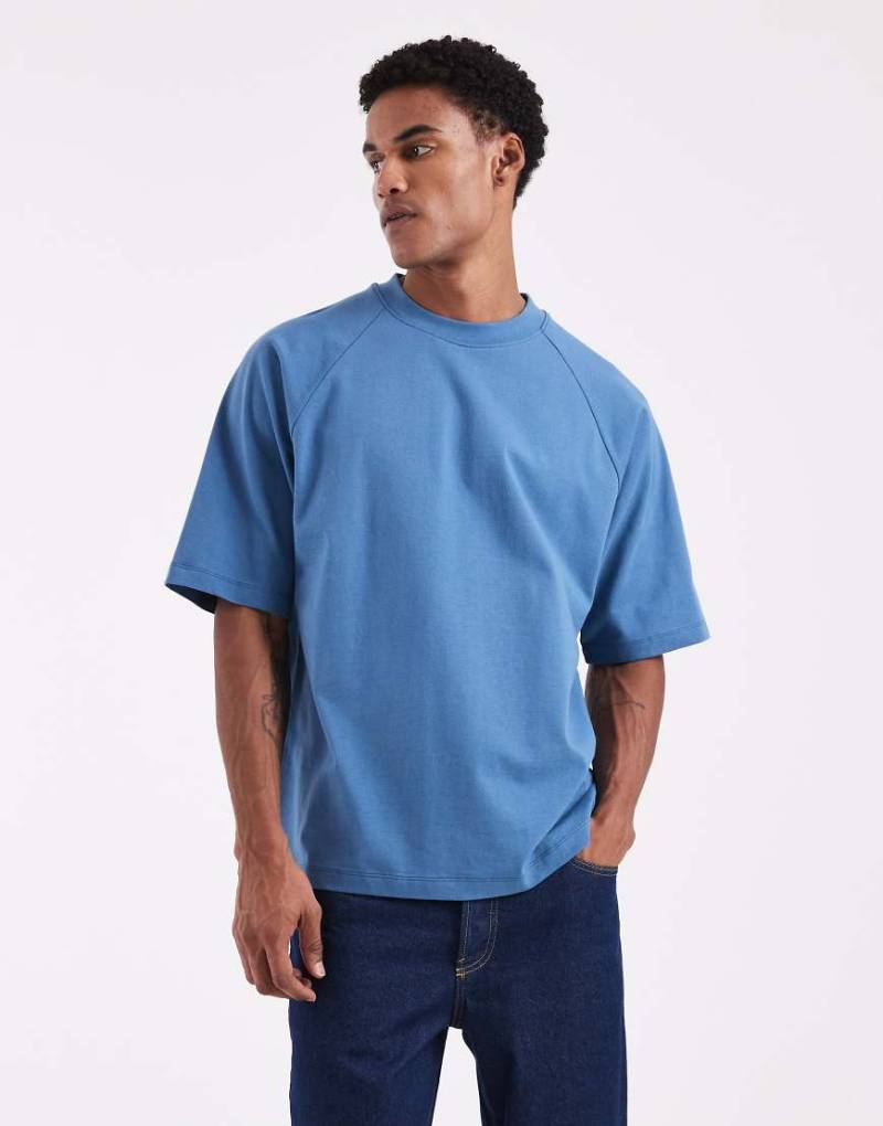 ASOS DESIGN - Oversize-T-Shirt aus schwerem Material in Mittelblau mit Raglanärmeln von ASOS DESIGN