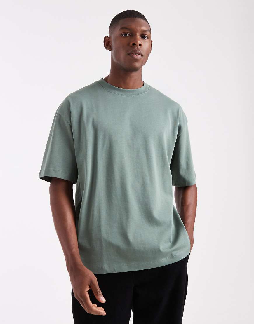 ASOS DESIGN - Oversize-T-Shirt aus schwerem Stoff in Grün von ASOS DESIGN