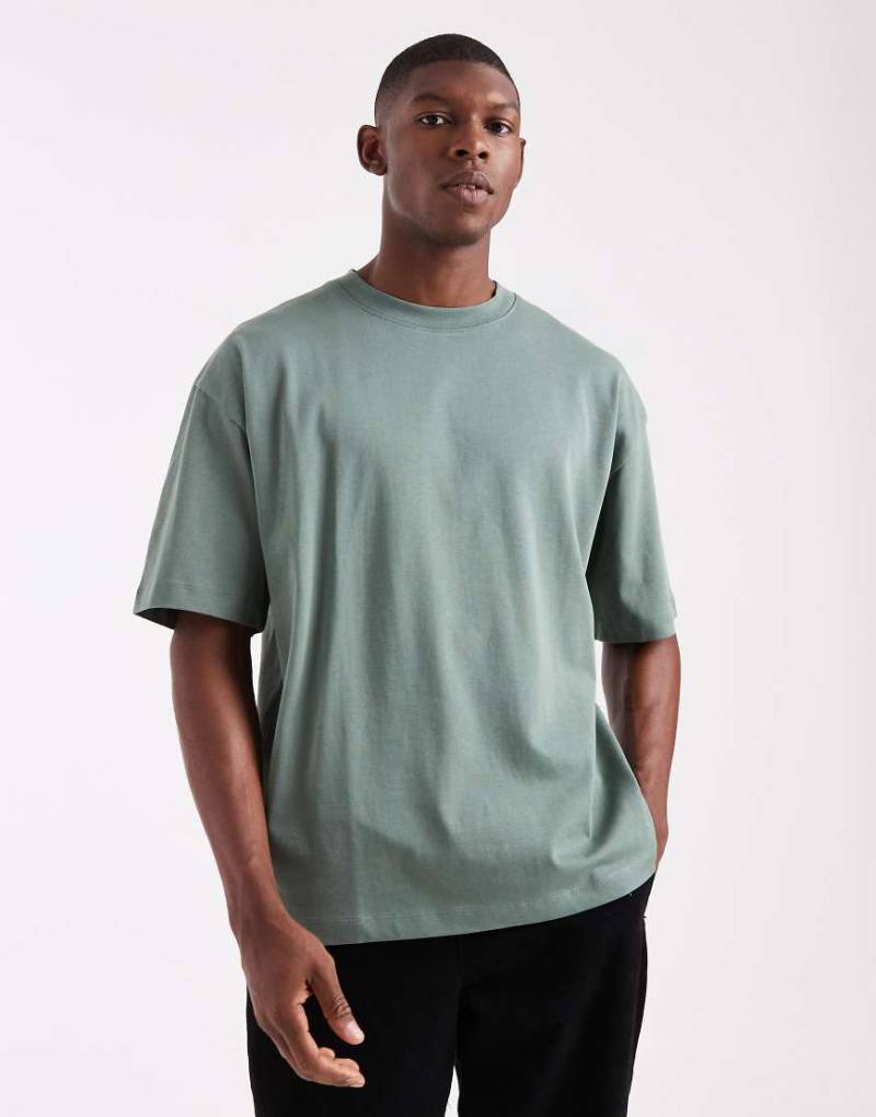 ASOS DESIGN - Oversize-T-Shirt aus schwerem Stoff in Grün von ASOS DESIGN