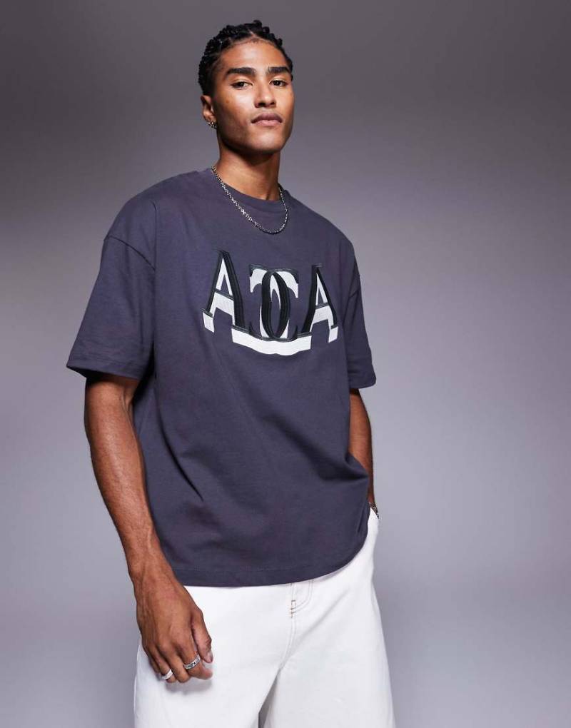 ASOS DESIGN - Oversize-T-Shirt in Anthrazit mit College-Stickerei vorne-Grau von ASOS DESIGN