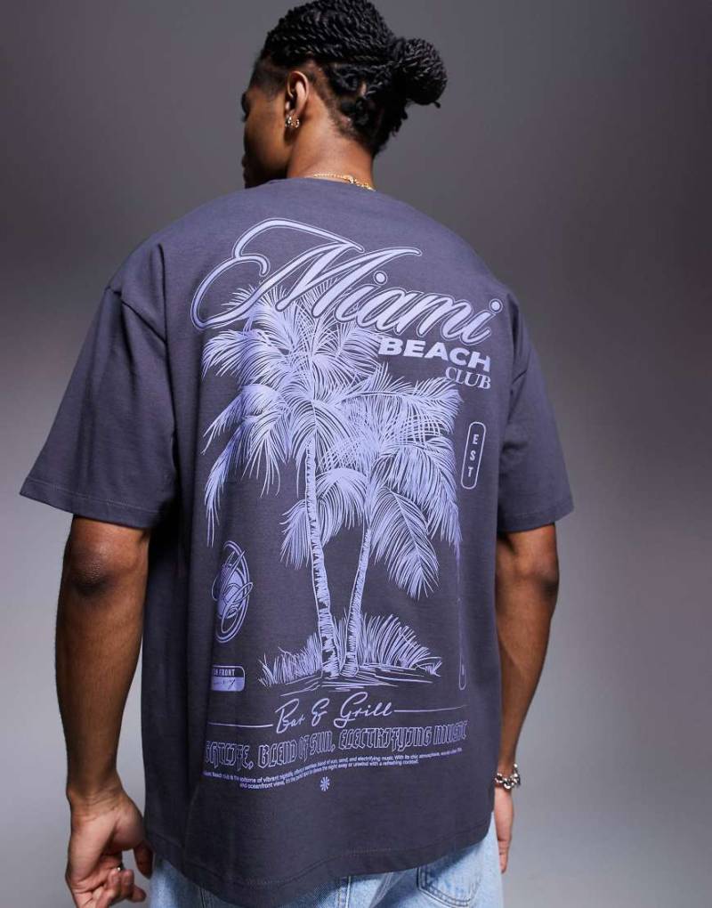 ASOS DESIGN - Oversize-T-Shirt in Anthrazit mit Palmen-Grafikprint-Weiß von ASOS DESIGN