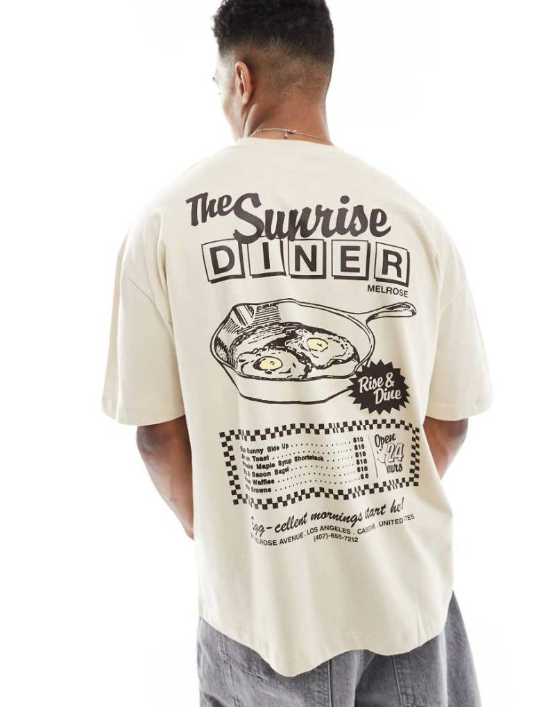 ASOS DESIGN - Oversize-T-Shirt in Beige mit Cartoon-Print-Neutral von ASOS DESIGN