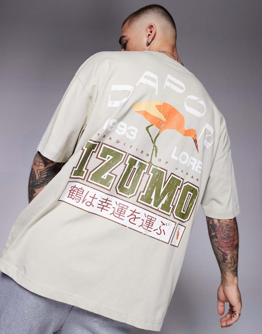 ASOS DESIGN - Oversize-T-Shirt in Beige mit Souvenir-Grafikprint-Neutral von ASOS DESIGN