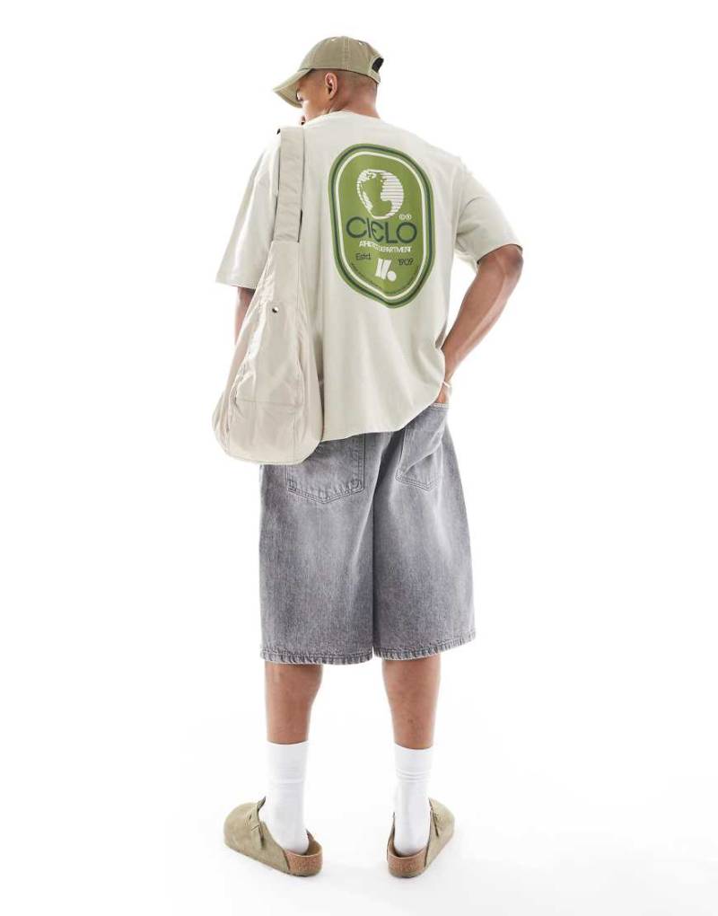 ASOS DESIGN - Oversize-T-Shirt in Beige mit Sports-Grafikprint-Neutral von ASOS DESIGN