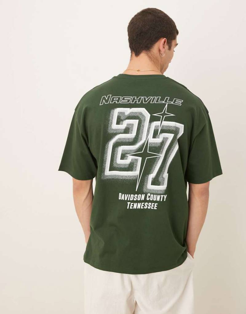 ASOS DESIGN - Oversize-T-Shirt in Dunkelgrün mit City-Grafik von ASOS DESIGN