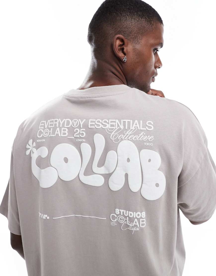 ASOS DESIGN - Oversize-T-Shirt in Grau mit Text-Grafikprint ASOS DESIGN - Oversize-T-Shirt in Grau mit Text-Grafikprint von ASOS DESIGN