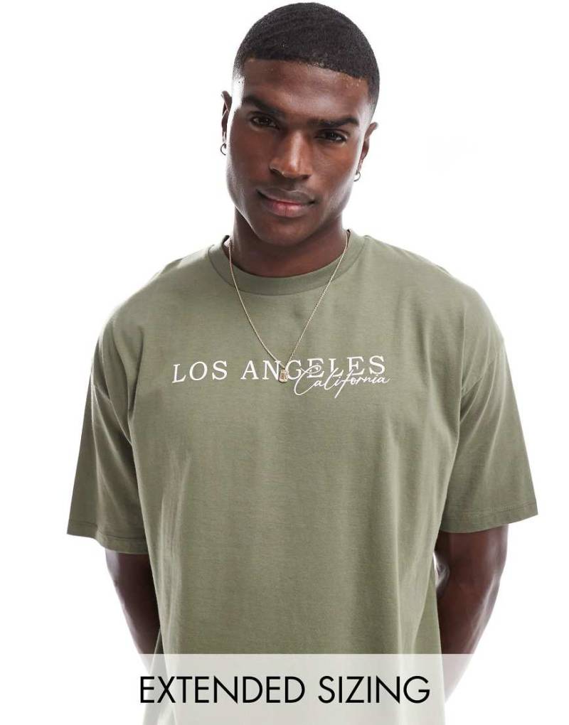 ASOS DESIGN - Oversize-T-Shirt in Grün mit City-Print vorn ASOS DESIGN - Oversize-T-Shirt in Grün mit City-Print vorn von ASOS DESIGN