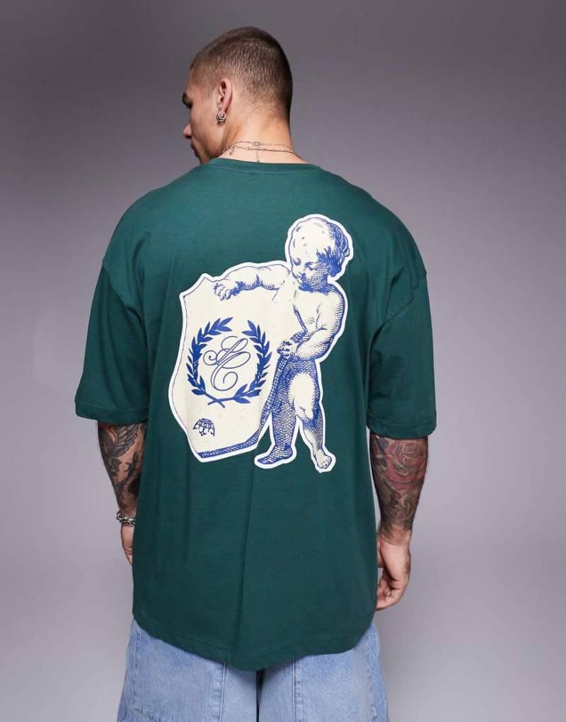 ASOS DESIGN - Oversize-T-Shirt in Grün mit Engel-Print von ASOS DESIGN