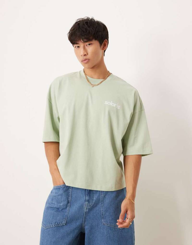 ASOS DESIGN - Kastiges Oversize-T-Shirt in Grün mit Schaumprint von ASOS DESIGN