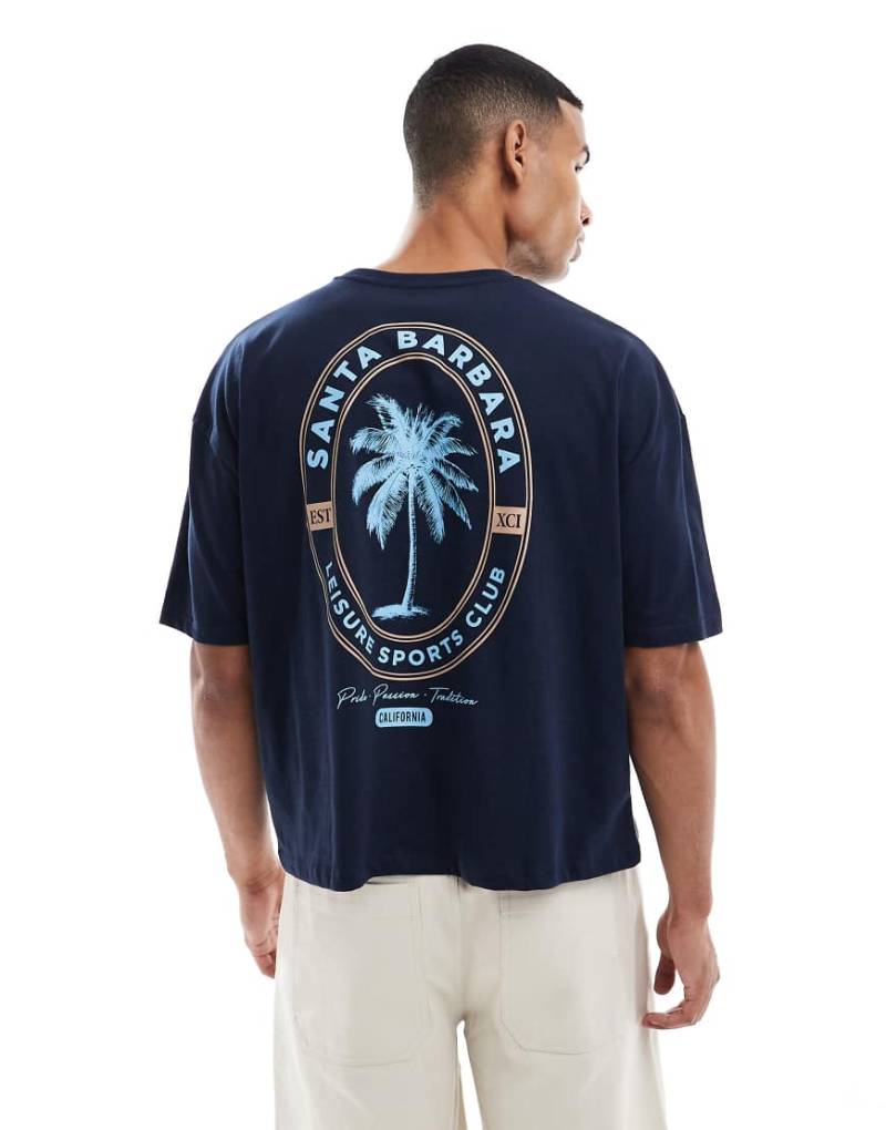 ASOS DESIGN - Oversize-T-Shirt in Hellbraun mit Sport-Grafik vorn von ASOS DESIGN