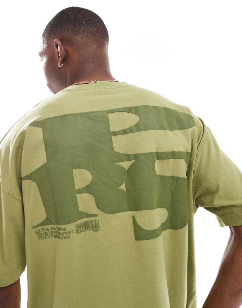 ASOS DESIGN - Oversize-T-Shirt in Khaki mit Stadtnamen-Grafikprint-Grün von ASOS DESIGN