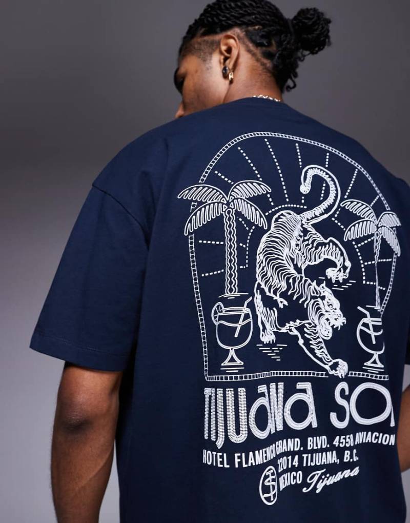 ASOS DESIGN - Oversize-T-Shirt in Marineblau mit „Tijuana"-Tiger-Print-Schwarz von ASOS DESIGN
