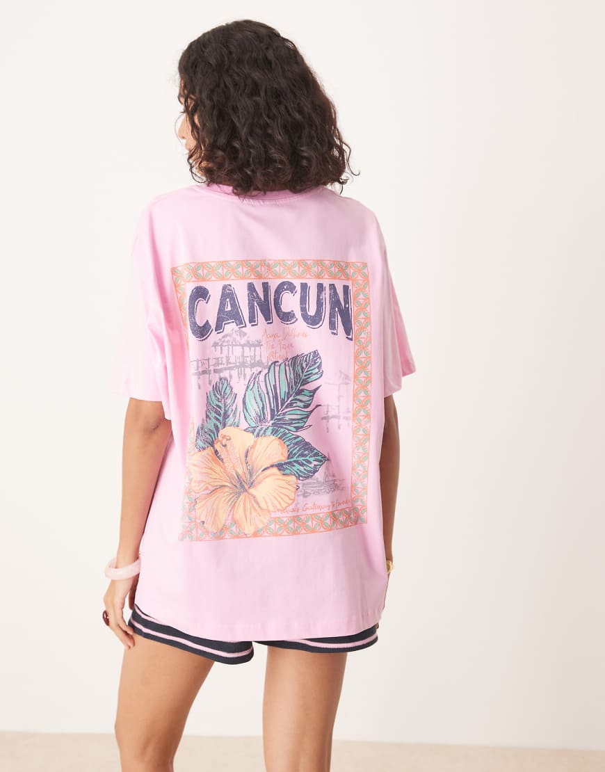 ASOS DESIGN - Oversize-T-Shirt in Rosa mit Cancun-Grafik von ASOS DESIGN