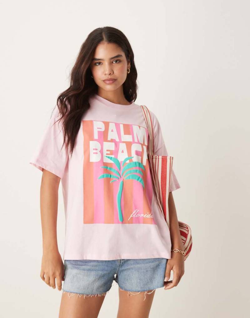 ASOS DESIGN - Oversize-T-Shirt in Rosa mit Palmen-Print von ASOS DESIGN