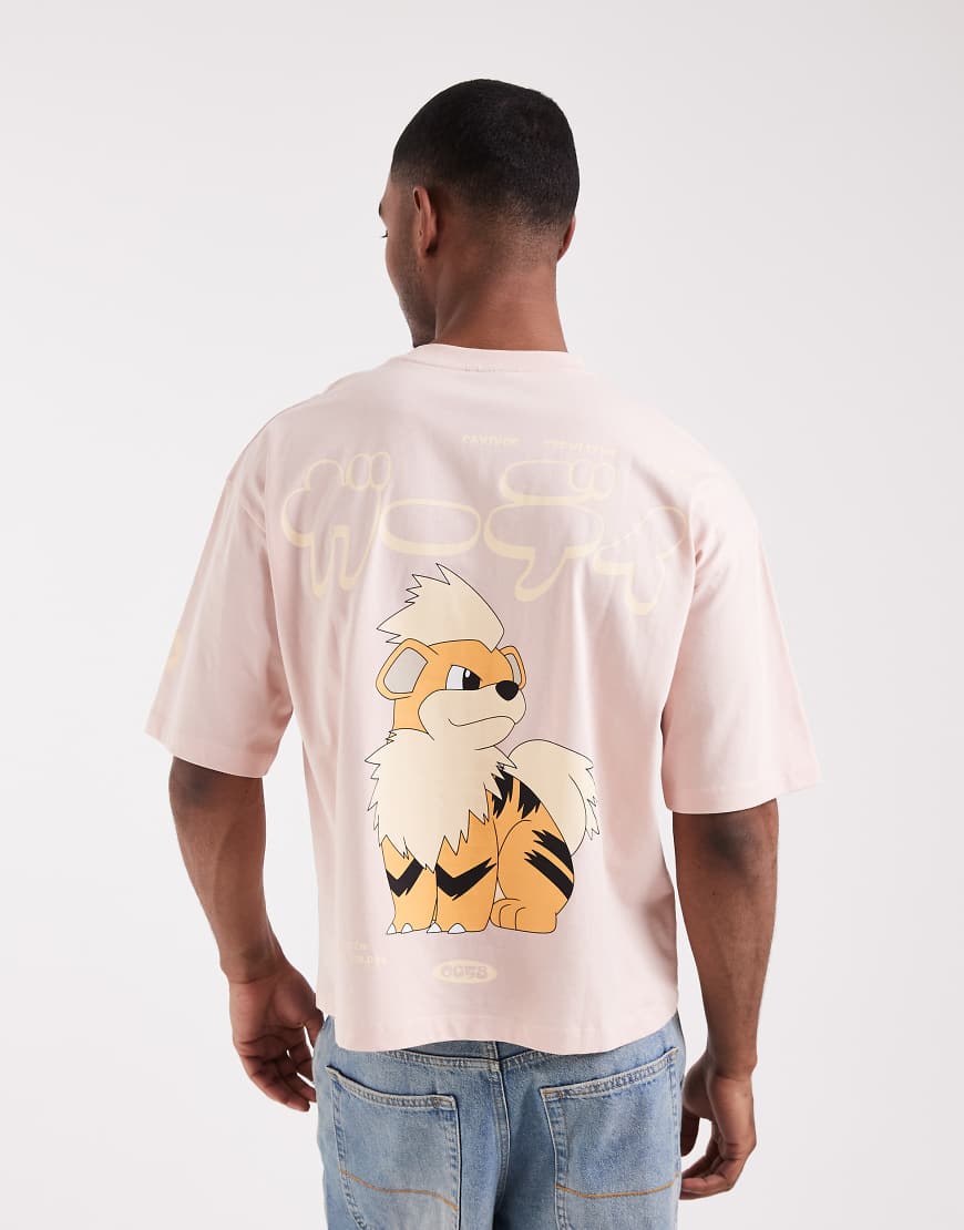 ASOS DESIGN - Oversize-T-Shirt in Rosa mit Pokémon-Growlithe-Print von ASOS DESIGN