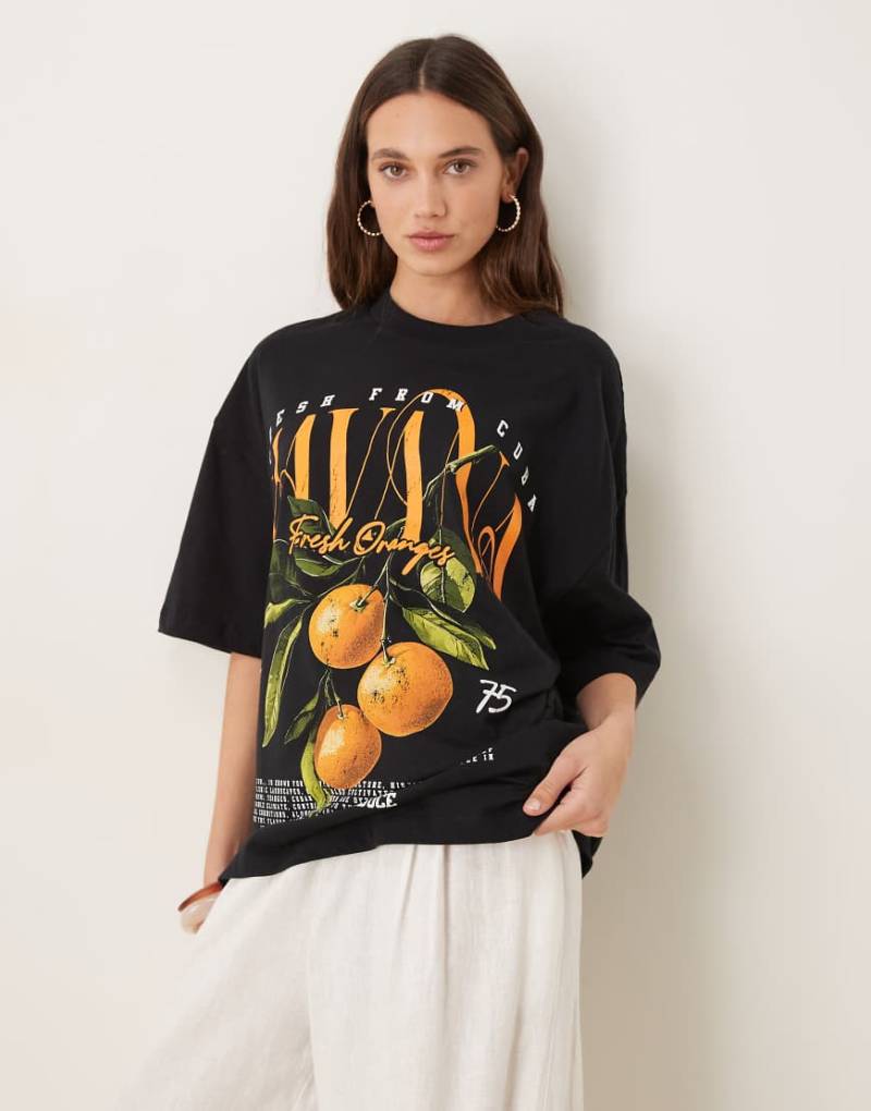 ASOS DESIGN - Oversize-T-Shirt in Schwarz mit „Havana"- und Orangen-Print von ASOS DESIGN