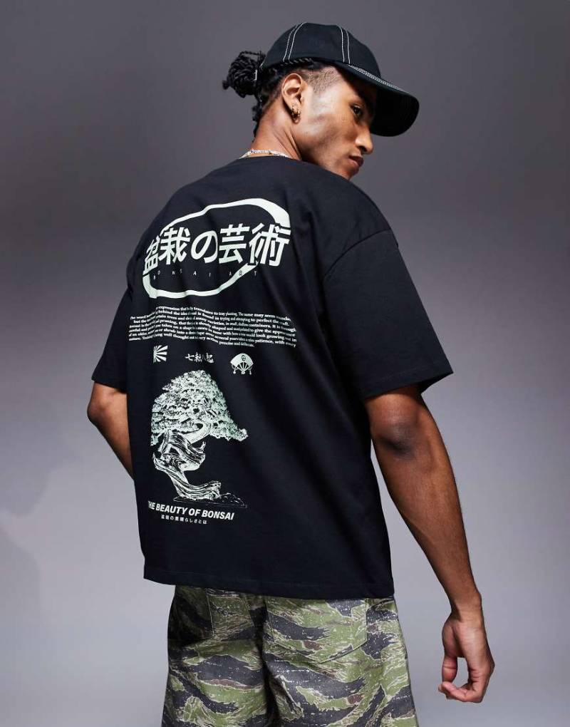 ASOS DESIGN - Oversize-T-Shirt in Schwarz mit Bonsai-Print von ASOS DESIGN