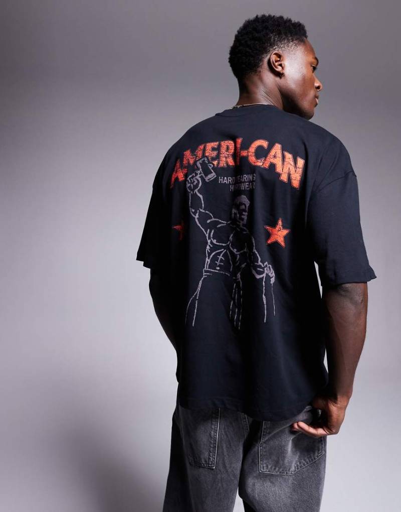 ASOS DESIGN - Oversize-T-Shirt in Schwarz mit Sportgrafik von ASOS DESIGN