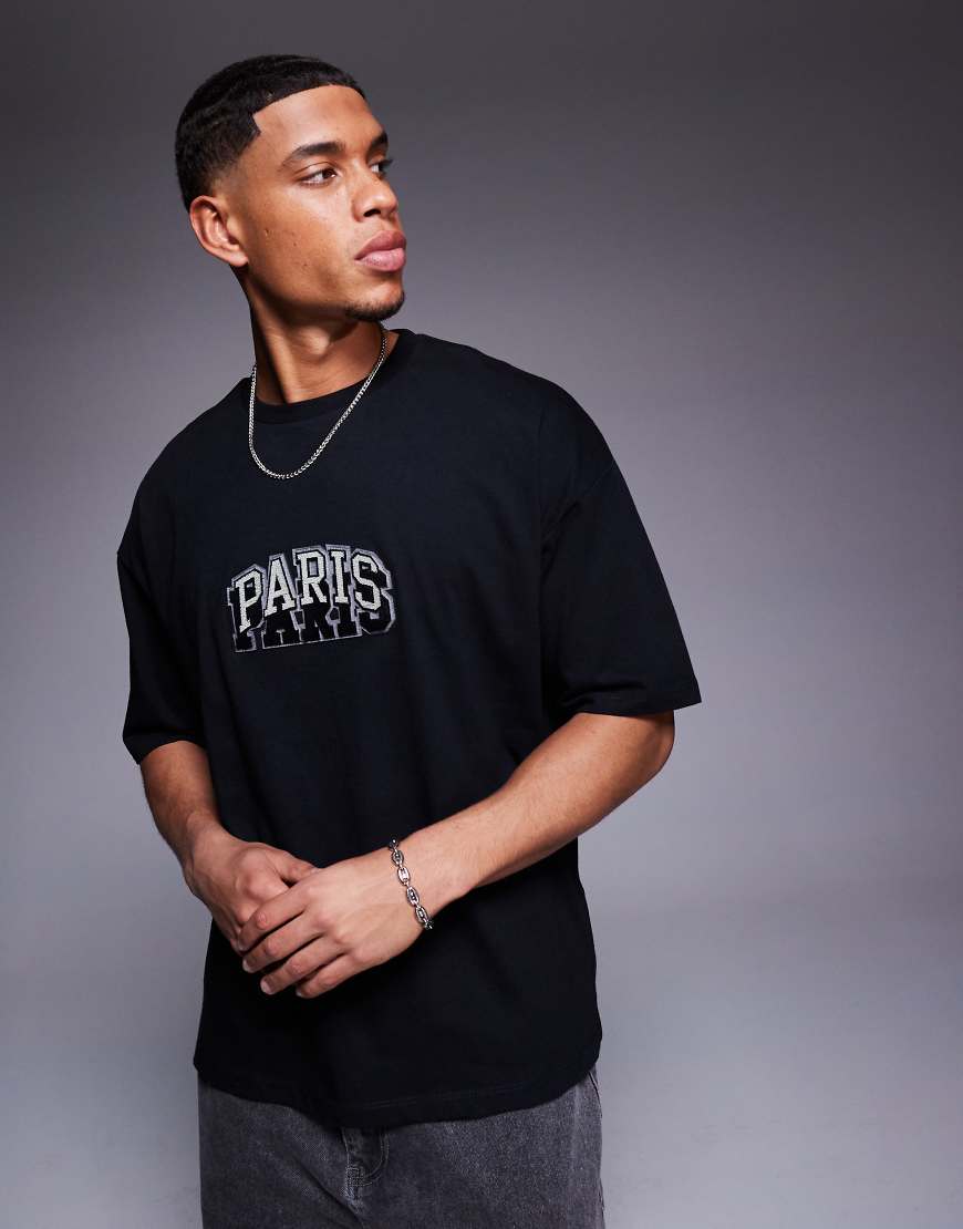 ASOS DESIGN - Oversize-T-Shirt in Schwarz mit Stadt-Stickerei auf Brusthöhe ASOS DESIGN - Oversize-T-Shirt in Schwarz mit Stadt-Stickerei auf Brusthöhe von ASOS DESIGN