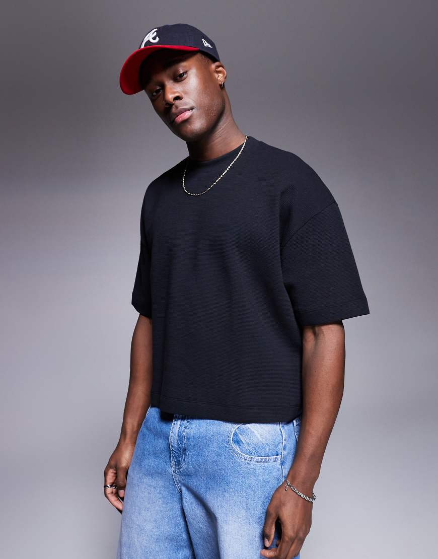ASOS DESIGN - Oversize-T-Shirt in Schwarz mit Waffelstruktur und kurzem Schnitt ASOS DESIGN - Oversize-T-Shirt in Schwarz mit Waffelstruktur und kurzem Schnitt von ASOS DESIGN