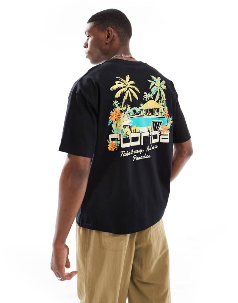 ASOS DESIGN - Oversize-T-Shirt in Schwarz mit sommerlicher Grafik von ASOS DESIGN