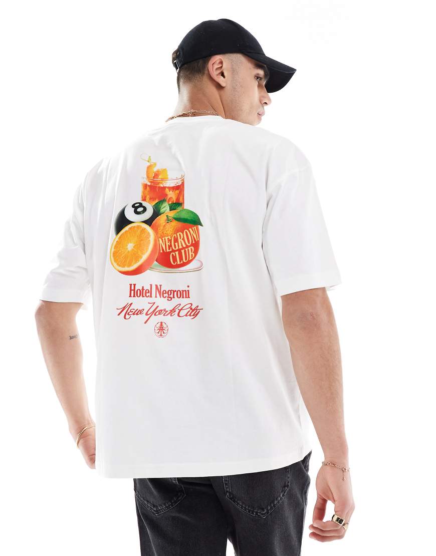 ASOS DESIGN - Oversize-T-Shirt in Weiß mit Frucht-Grafik ASOS DESIGN - Oversize-T-Shirt in Weiß mit Frucht-Grafik von ASOS DESIGN