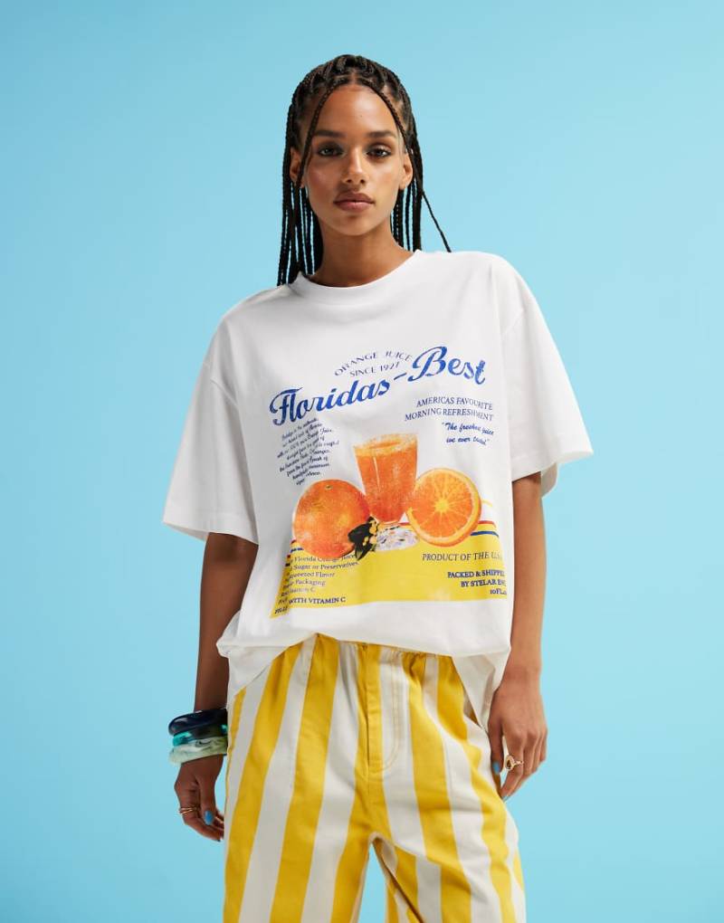 ASOS DESIGN - Oversize-T-Shirt in Weiß mit Orangensaft-Grafik von ASOS DESIGN