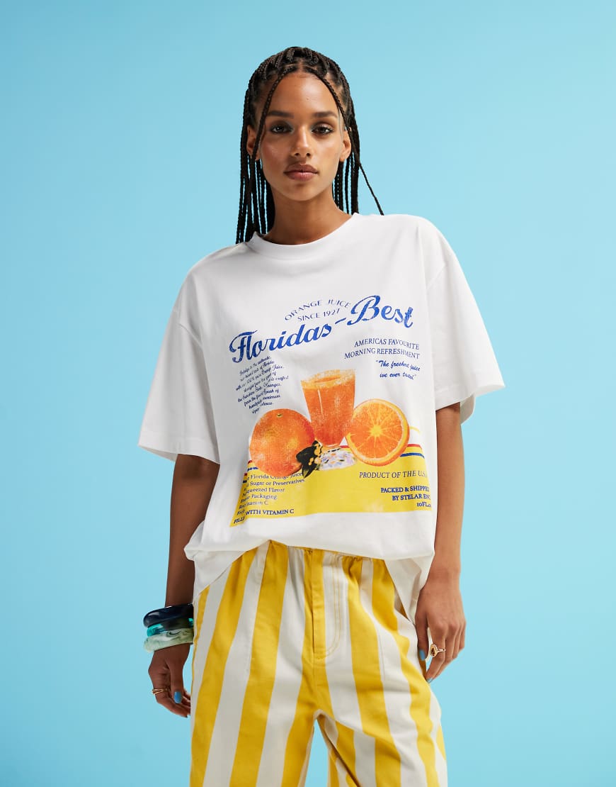 ASOS DESIGN - Oversize-T-Shirt in Weiß mit Orangensaft-Grafik von ASOS DESIGN