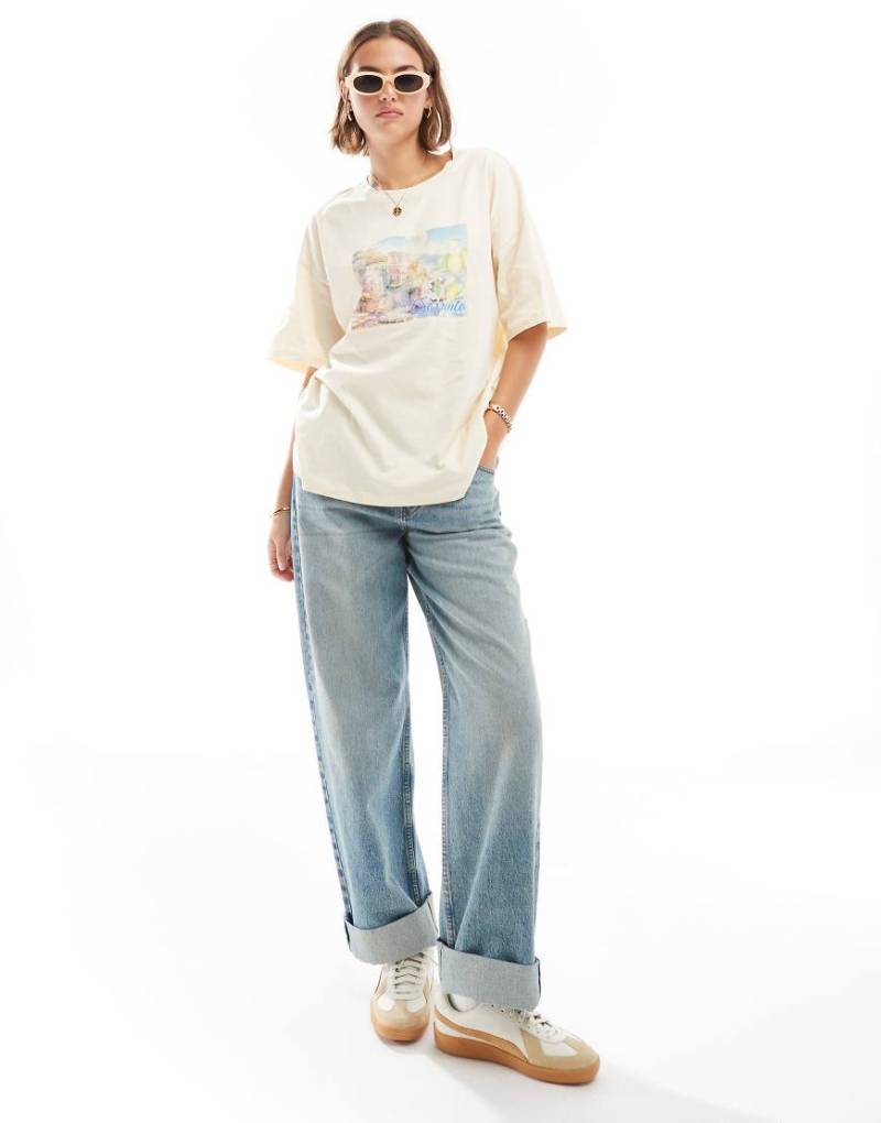 ASOS DESIGN - Oversize-T-Shirt in Zitronengelb mit „Sorrento"-Aquarellgrafik von ASOS DESIGN