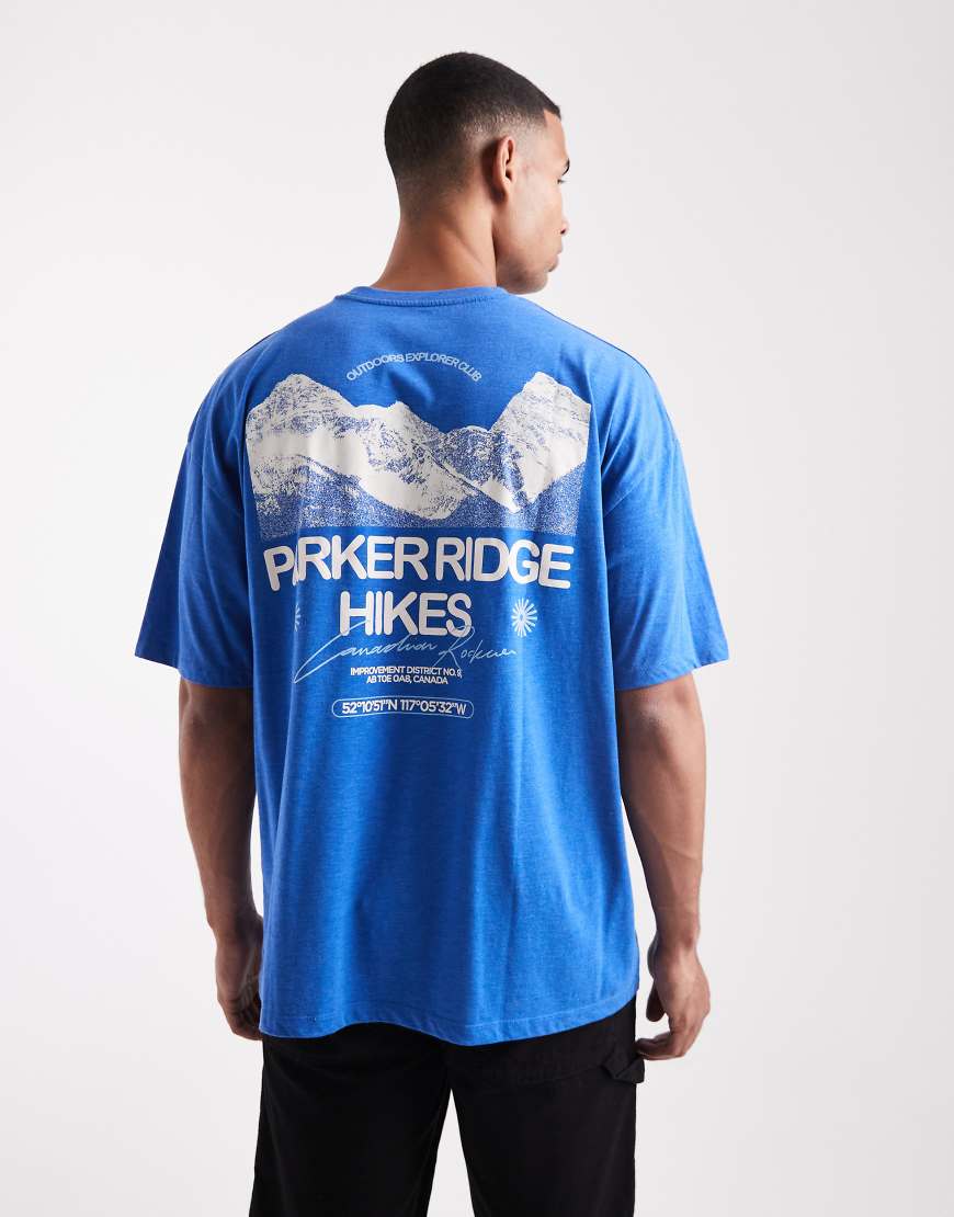 ASOS DESIGN - Oversize-T-Shirt in blauer Waschung mit Landschafts-Grafikprint von ASOS DESIGN