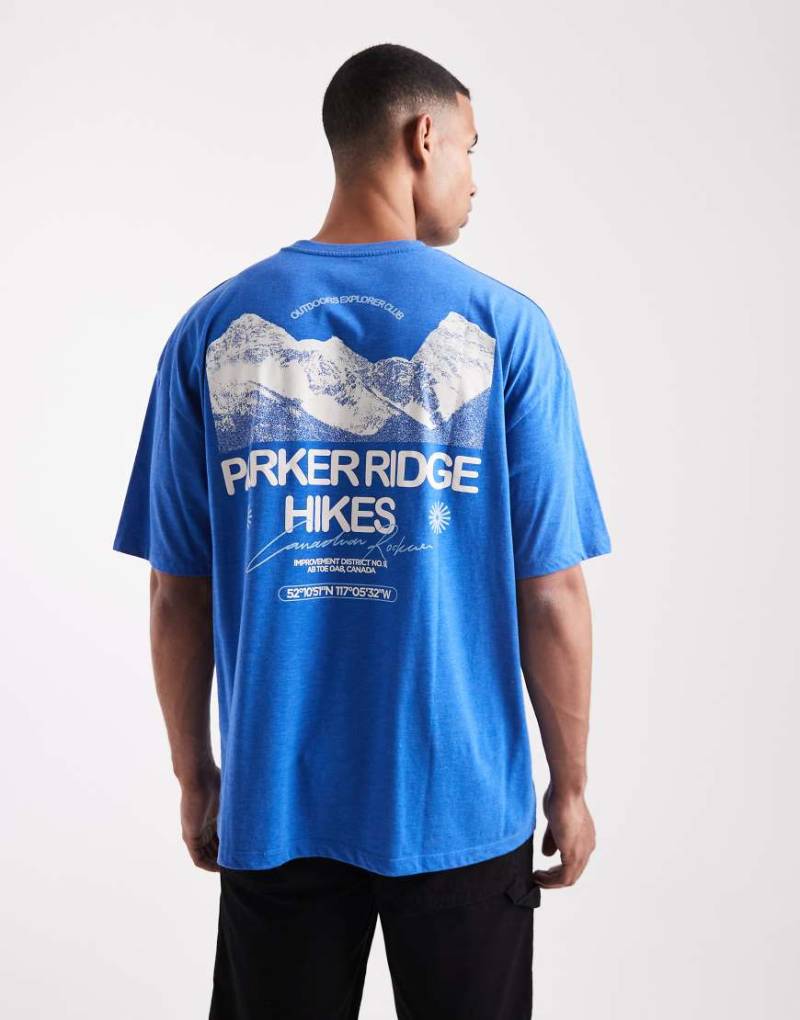 ASOS DESIGN - Oversize-T-Shirt in blauer Waschung mit Landschafts-Grafikprint ASOS DESIGN - Oversize-T-Shirt in blauer Waschung mit Landschafts-Grafikprint von ASOS DESIGN