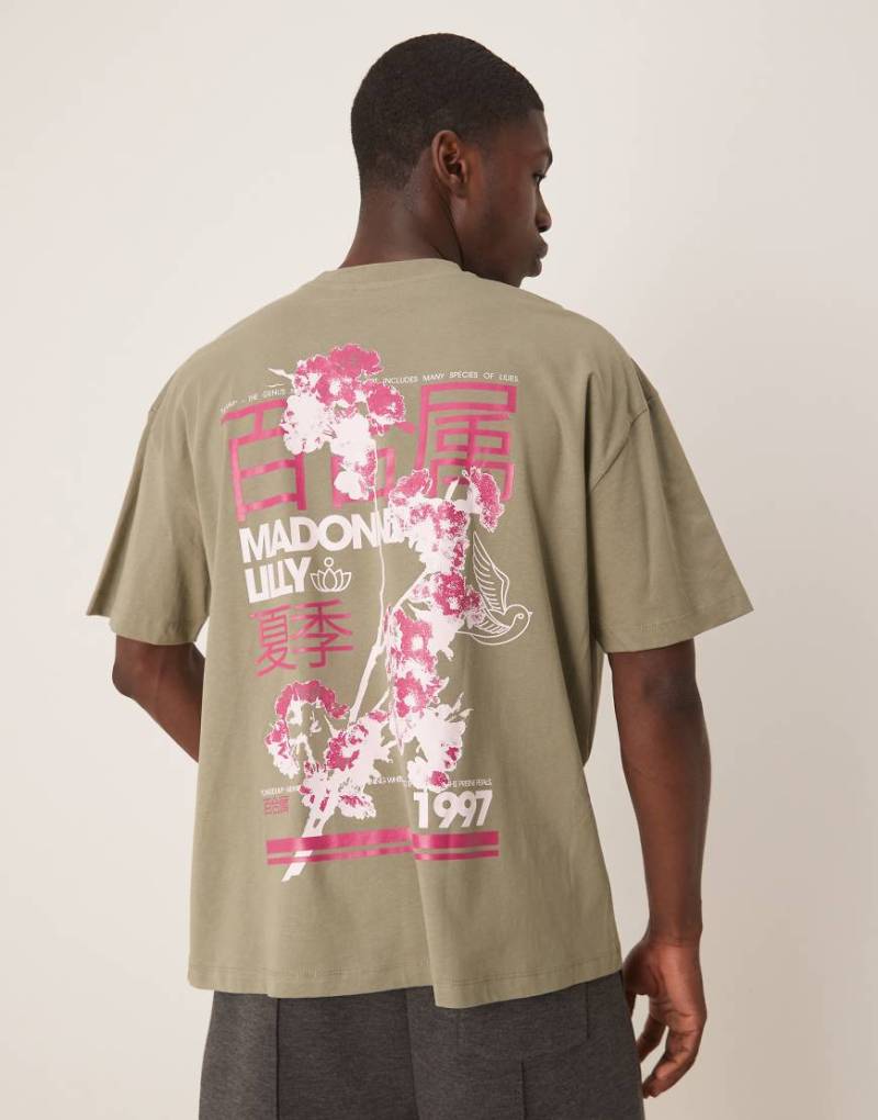 ASOS DESIGN - Oversize-T-Shirt in hellem Khaki mit Blumenprint-Grün von ASOS DESIGN