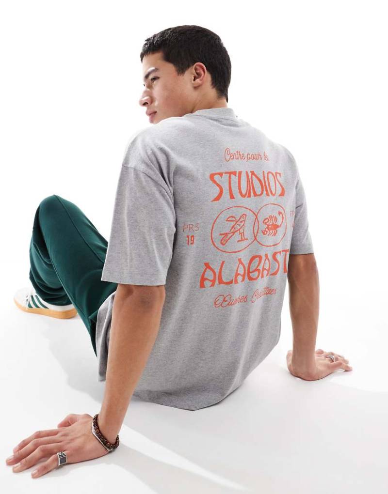 ASOS DESIGN - Oversize-T-Shirt in meliertem Grau mit Schriftzug-Print auf dem Rücken von ASOS DESIGN
