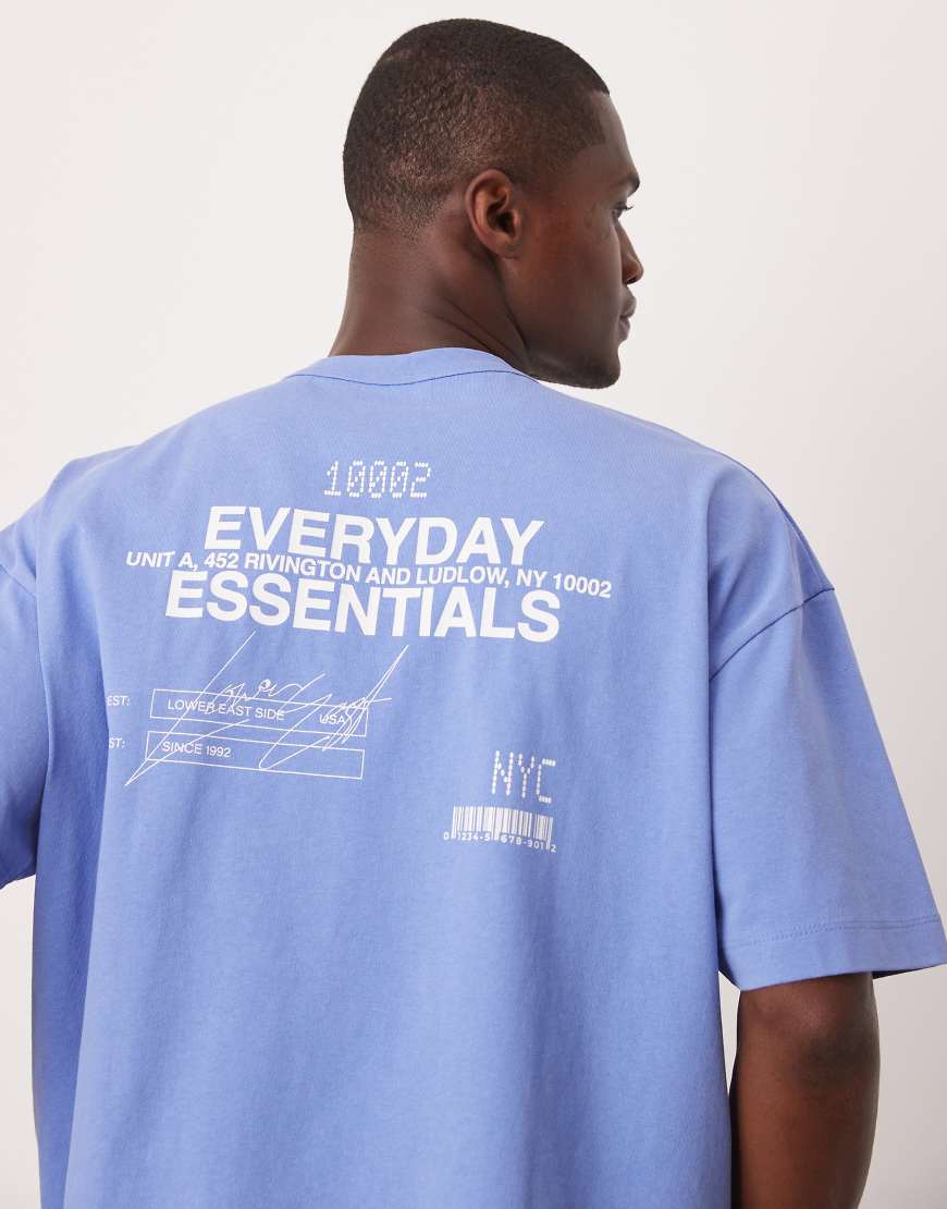 ASOS DESIGN - Oversize-T-Shirt in verwaschenem Blau mit Textprint am Rücken von ASOS DESIGN