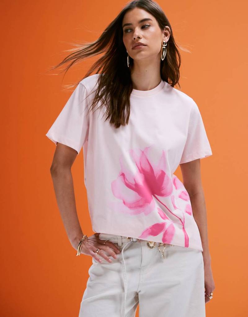 ASOS DESIGN - Oversize-T-Shirt mit Rosen-Grafik in Rosa von ASOS DESIGN