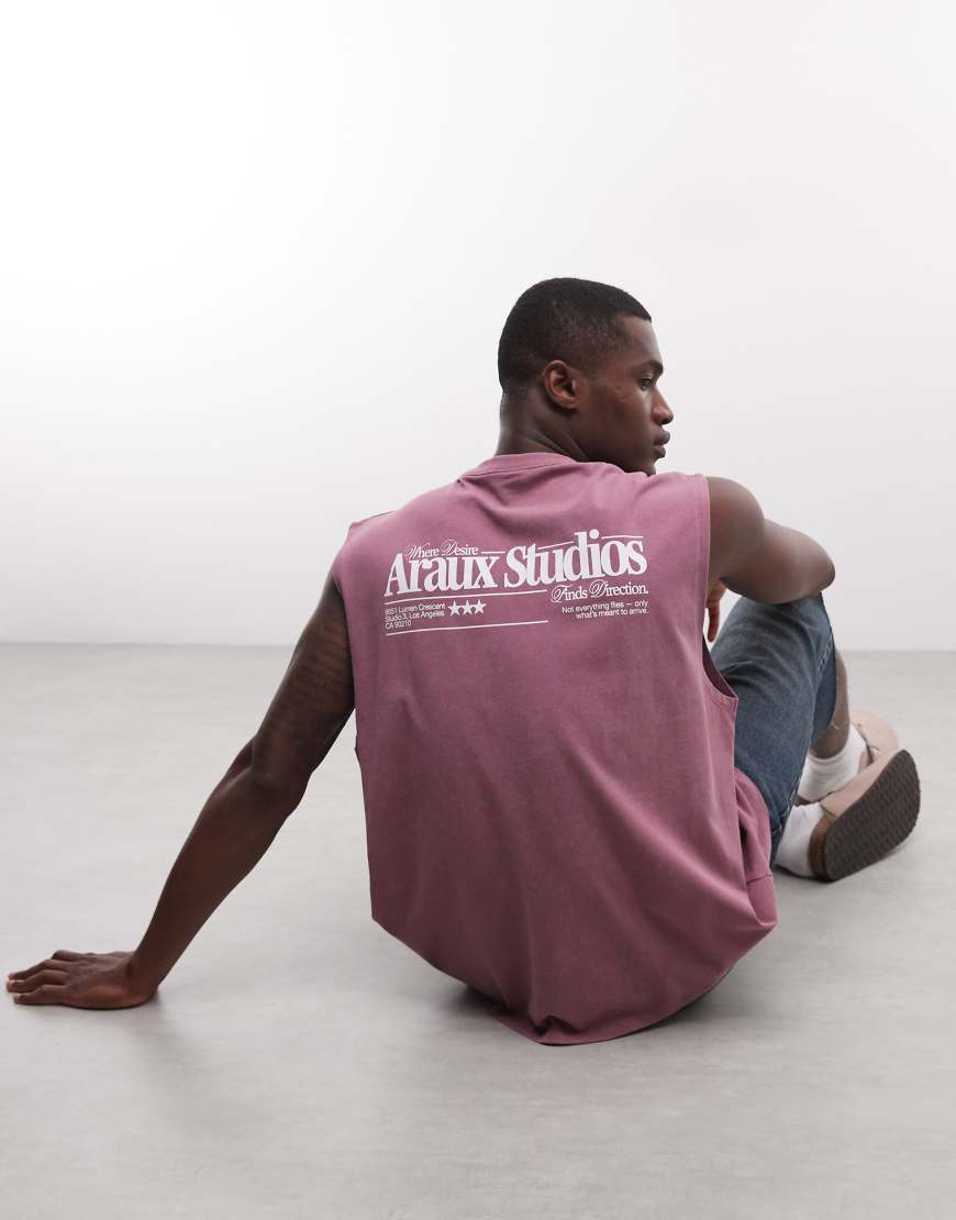 ASOS DESIGN - Oversize-Tanktop in rosa Waschung mit Text-Grafikprint von ASOS DESIGN