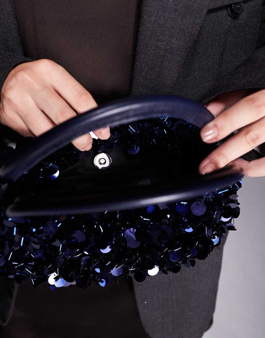 ASOS DESIGN - Pailletten-Clutch in Marineblau mit Henkel von ASOS DESIGN