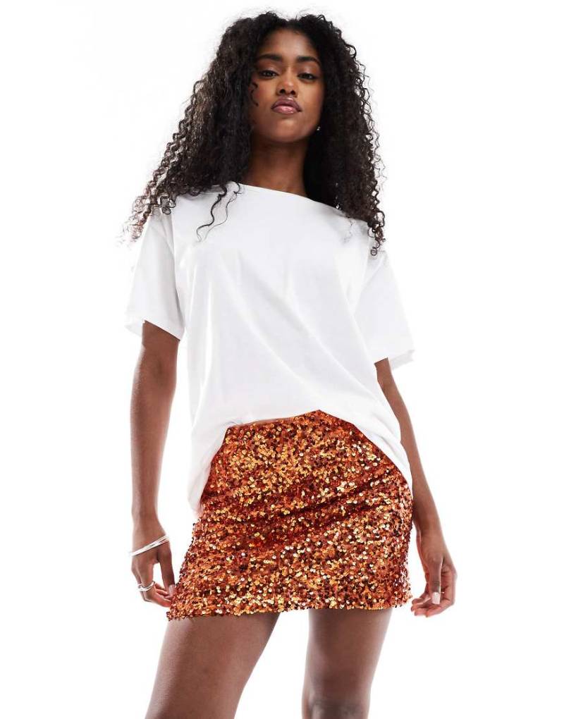 ASOS DESIGN - Pailletten-Minirock in Orange-Gelb von ASOS DESIGN