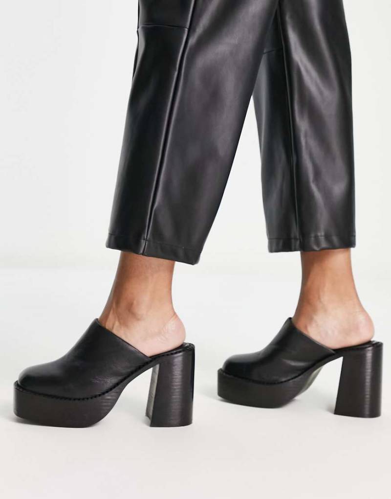 ASOS DESIGN - Pierre - Mules aus hochwertigem Leder in Schwarz mit Absatz und dicker Sohle von ASOS DESIGN
