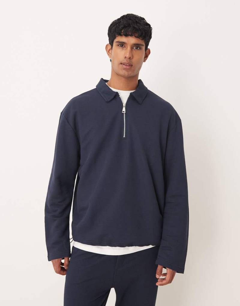 ASOS DESIGN - Pikee-Polohemd in Marineblau mit kurzem Reißverschluss und Oversize-Passform, Kombiteil-Grau ASOS DESIGN - Pikee-Polohemd in Marineblau mit kurzem Reißverschluss und Oversize-Passform, Kombiteil-Grau von ASOS DESIGN
