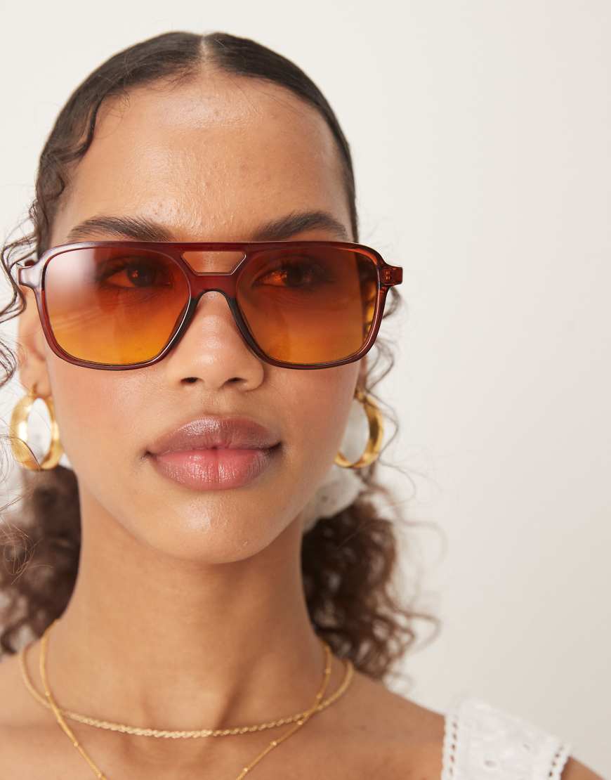 ASOS DESIGN - Piloten-Sonnenbrille in Kristallbraun mit Gläsern in Orange mit Farbverlauf ASOS DESIGN - Piloten-Sonnenbrille in Kristallbraun mit Gläsern in Orange mit Farbverlauf von ASOS DESIGN