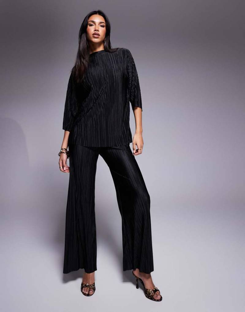 ASOS DESIGN - Plissierter 2-in-1-Jumpsuit aus Cord-Imitat in Schwarz-Grün von ASOS DESIGN