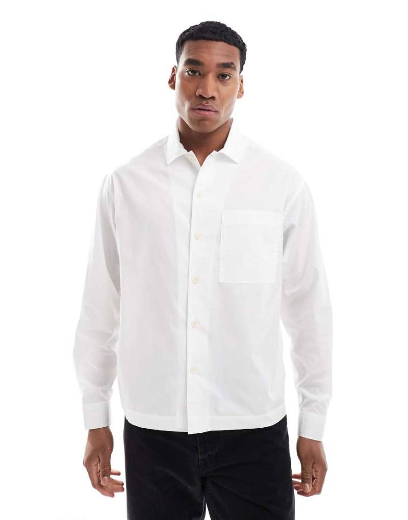 ASOS DESIGN Plus -Kastiges Oversize-Hemd aus Popeline in Weiß mit Knopfleiste von ASOS DESIGN