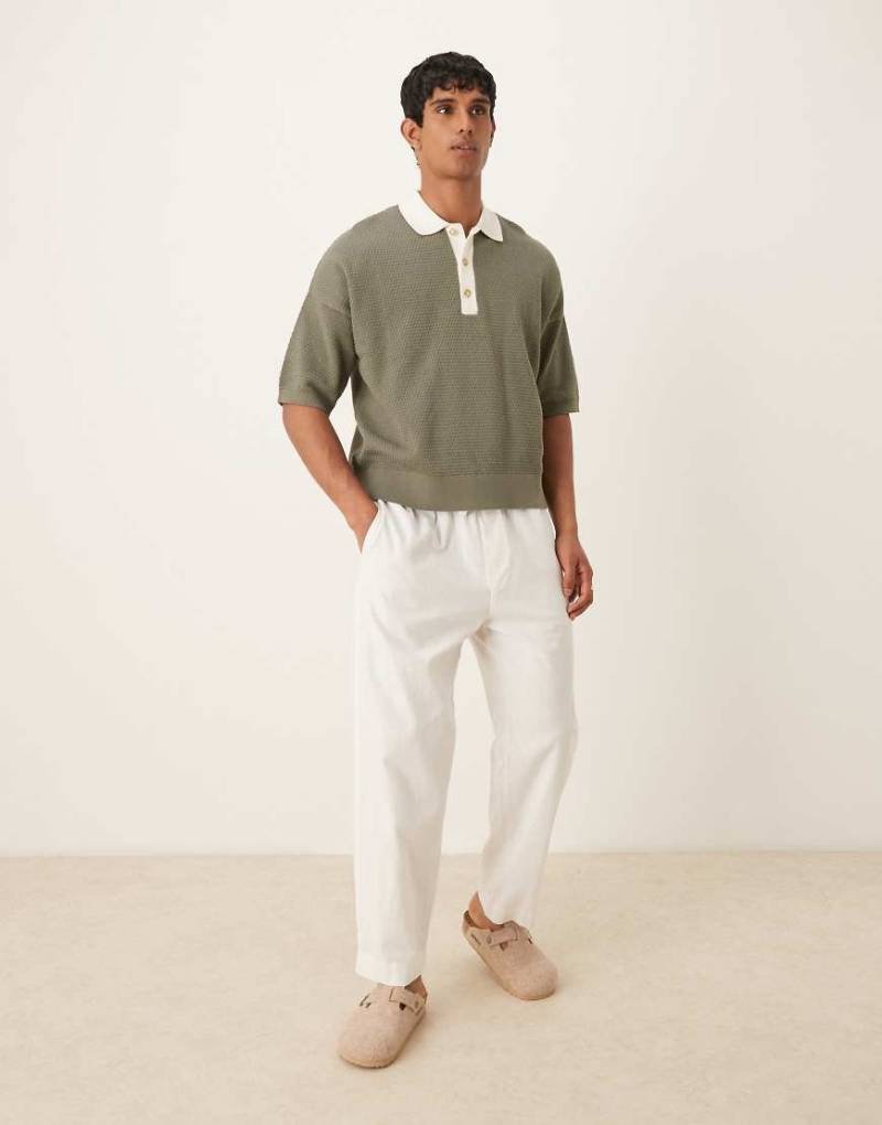 ASOS DESIGN - Polohemd aus Strick in Khaki mit Oversize-Schnitt-Grün von ASOS DESIGN