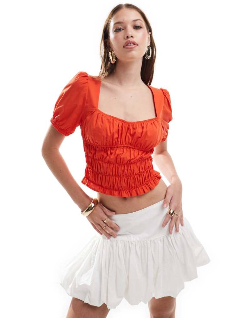 ASOS DESIGN - Popeline-Bluse in Rot mit geraffter Taille und Puffärmeln von ASOS DESIGN